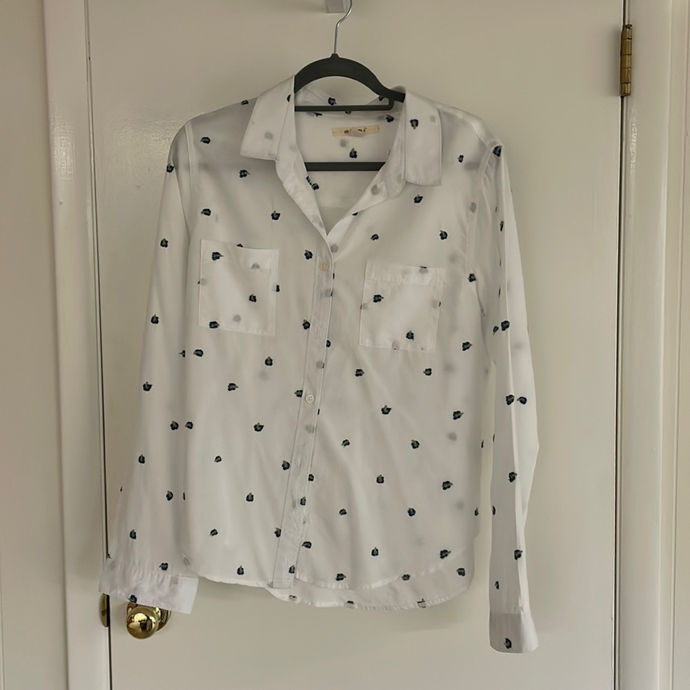 Buttons down with blue flower detail